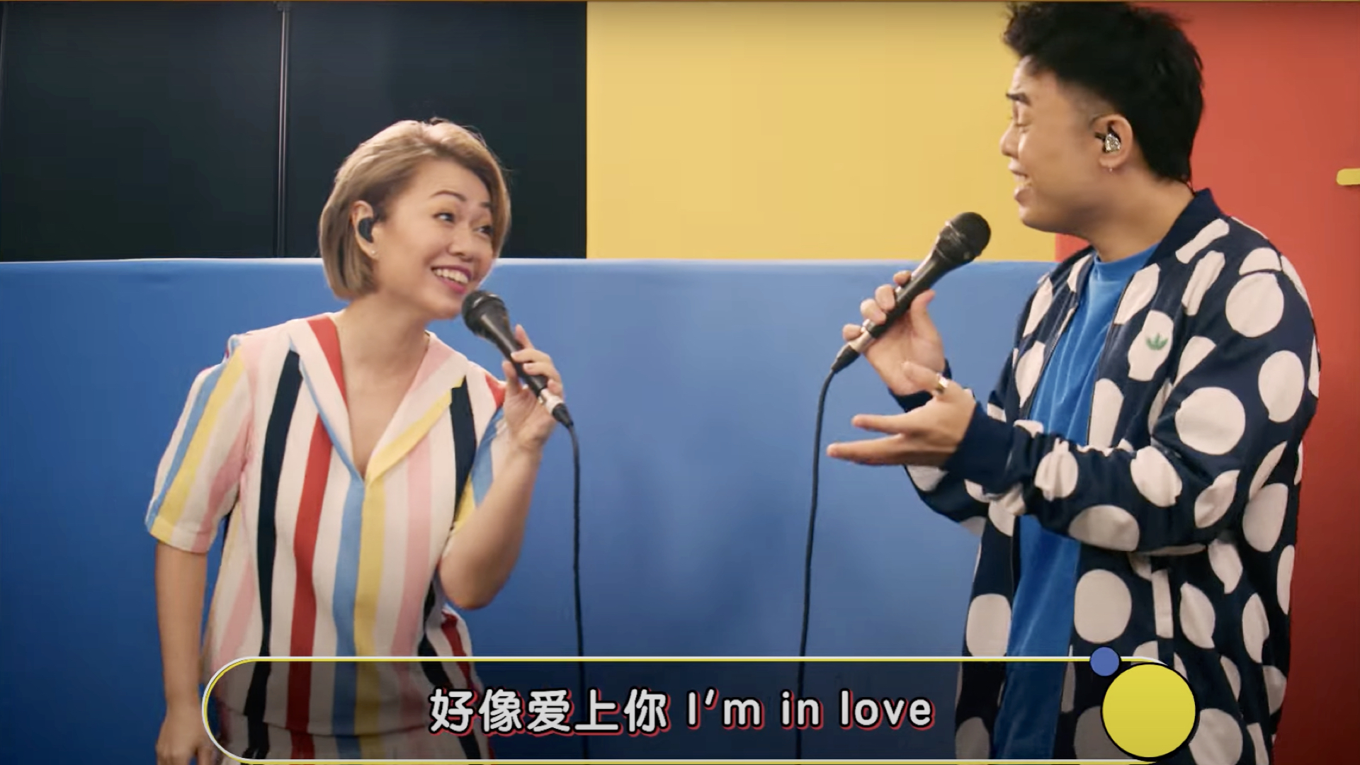 Image of Joanna Dong and Juni Goh singing on Backstage Pass